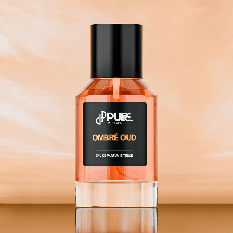 Ombré Oud von PURE. Parfums steht vor einem orangefarbenen Himmel als intensives Eau de Parfum Intense mit warmer Ausstrahlung